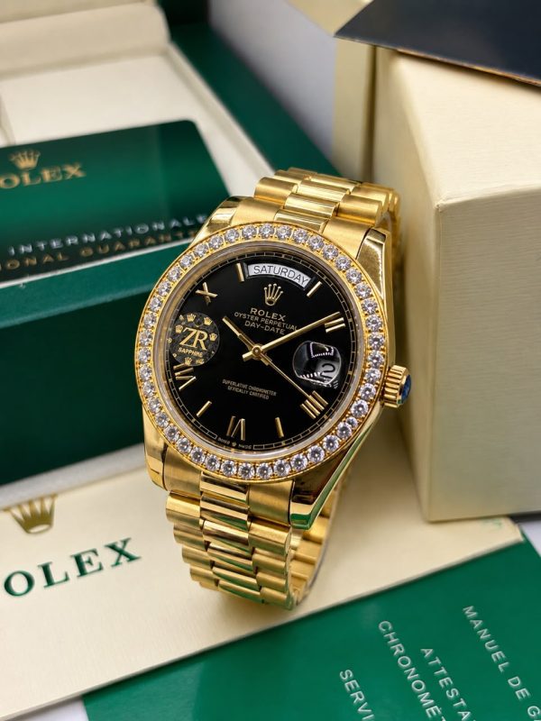 Yellow/Rose gold day date Roman Numeral Rolex stoned watch